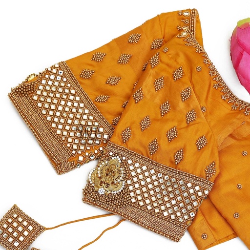 Orange blouse with lakshmi pendant