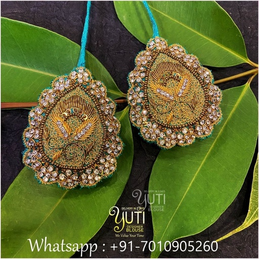 Green tilagam shaped flower tassle