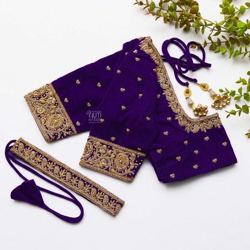 Feeling like royalty in this exquisite midnight purple bridal blouse