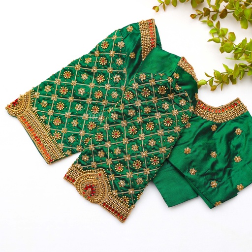 Indulge in the rich beauty of our Dark Green embroidery blouse.