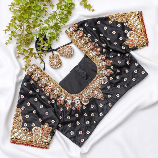 Black shade bridal blouse with a golden Embroidery work