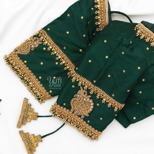 Dark green kundan,hangings design